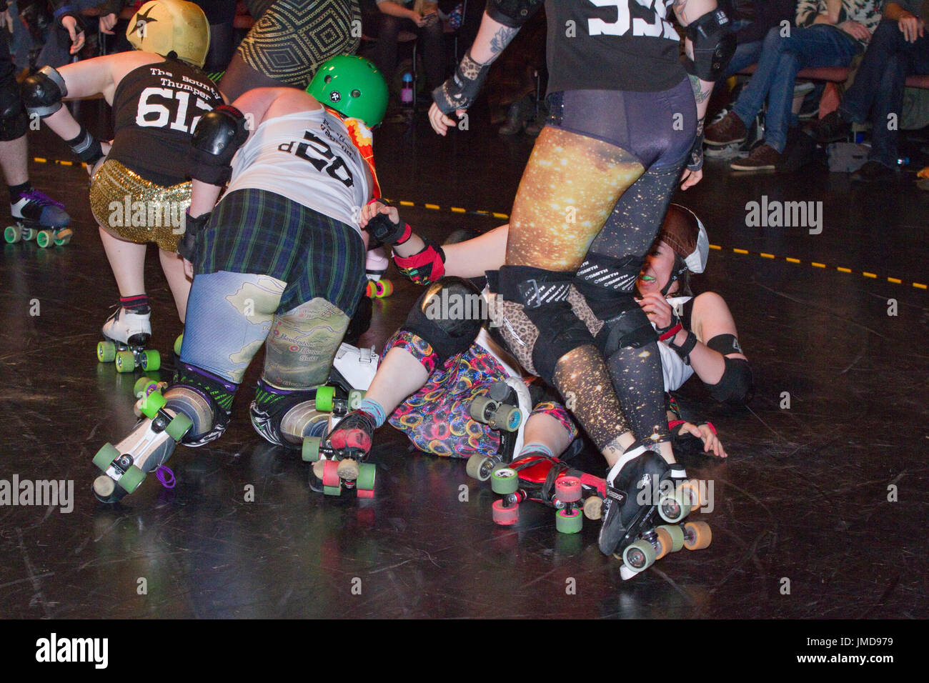 Pile up during a roller derby bout Stock Photo - Alamy
