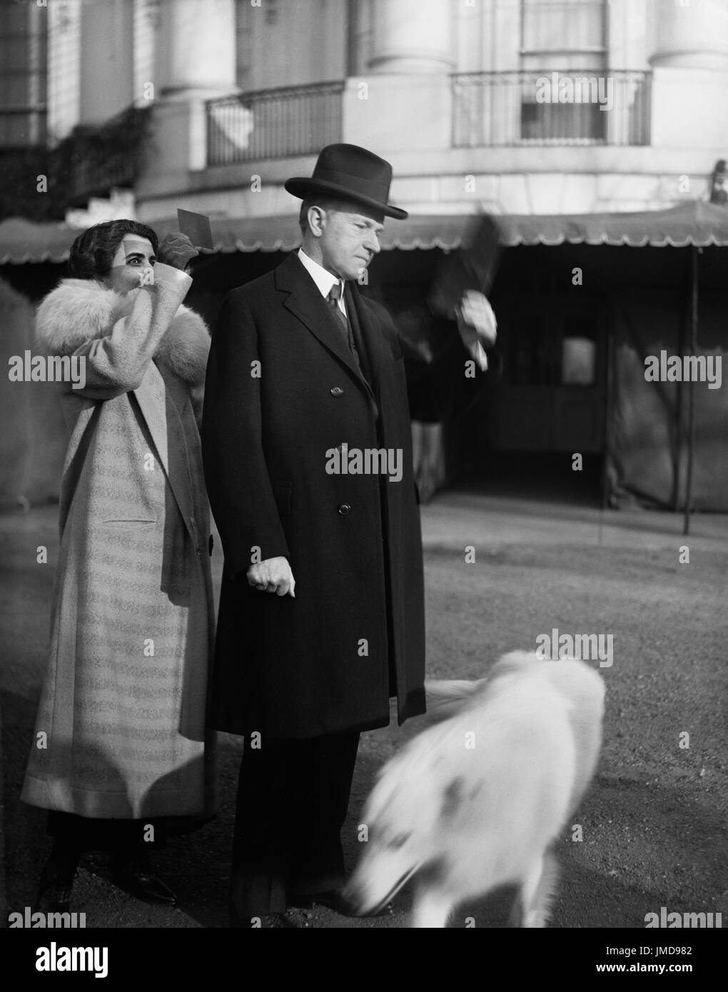 U.S. President Calvin Coolidge and First Lady Grace Coolidge viewing Solar Eclipse from White House Lawn, Washington DC, USA, Harris & Ewing, January 24, 1925 Stock Photo