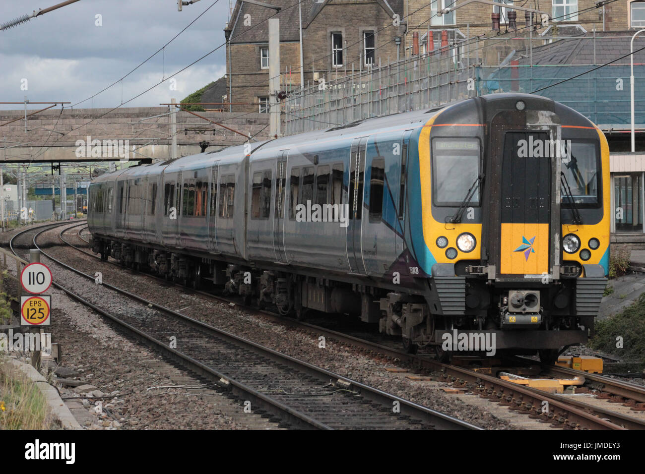 Desiro class 350 electric multiple unit train passing through Carnforth on the West Coast Main Line with a First TransPennine Express.passenger train. Stock Photo