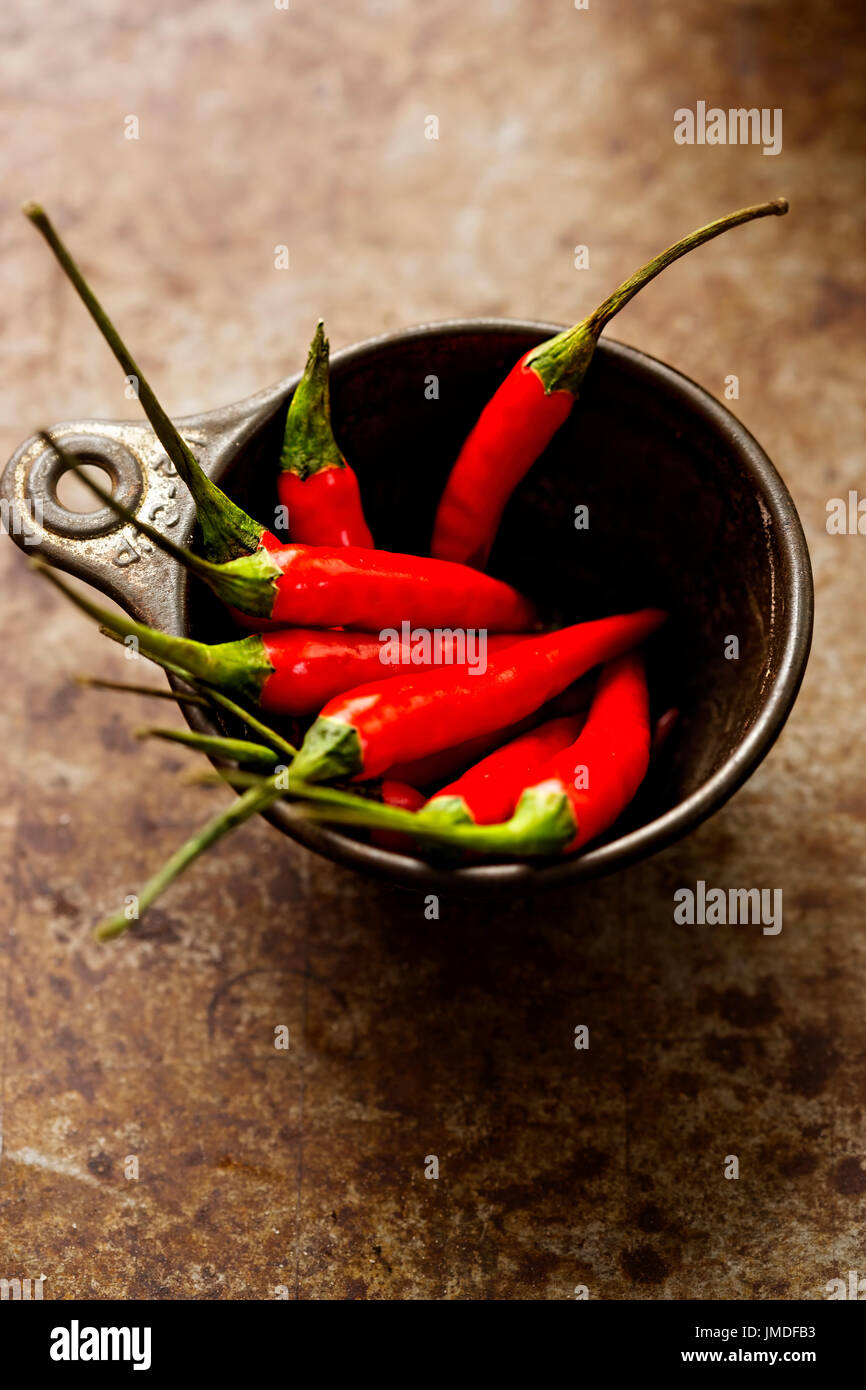 Chili peppers in cup hi-res stock photography and images - Alamy