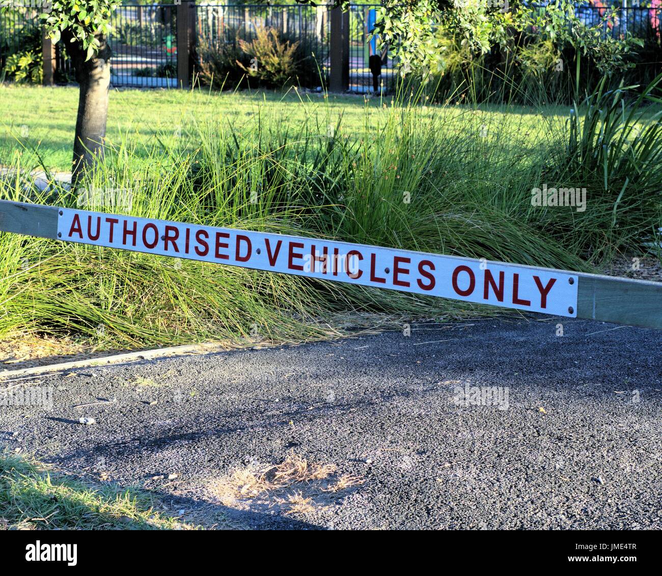 Sign parking barrier 'Authorised Vehicles Only'. Concept of no parking allowed for all vehicles. No thorough fare. Stock Photo
