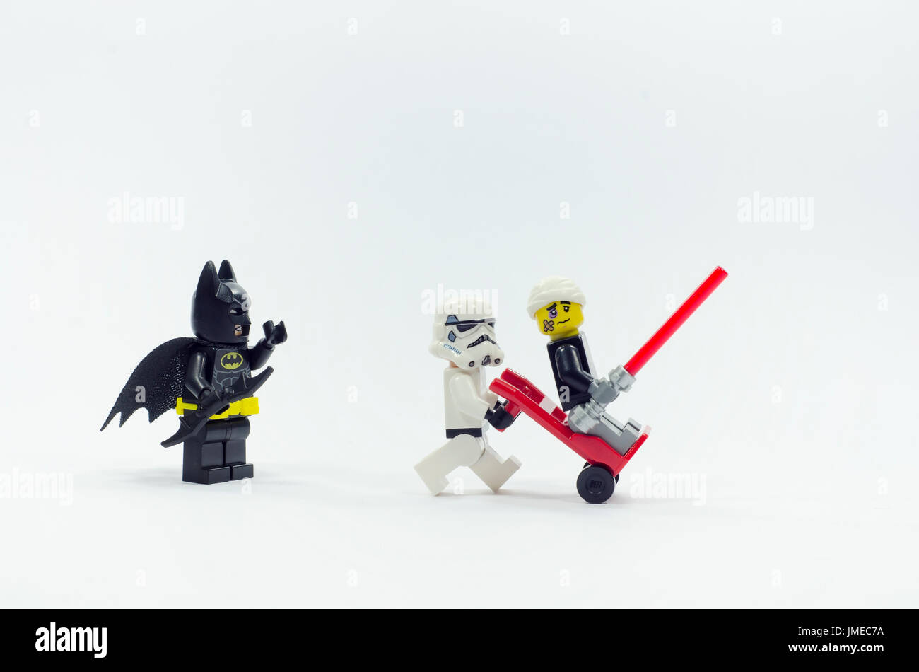 lego darth vader injured after fighting batman. isolated on white ...