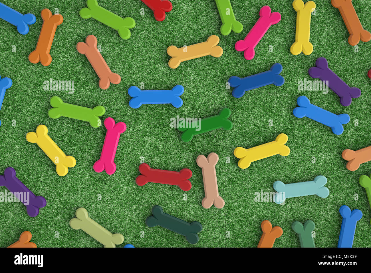 colorful dog bones on green turf background Stock Photo Alamy
