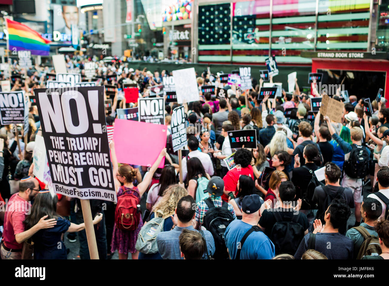 New York City, United States. 26th July, 2017. On July 26, 2017, after a series of tweets by President Donald Trump, which proposed to ban transgender people from military service, thousands of New Yorkers took the streets of in opposition. Thousands of transgender soldiers are currently serving in all branches of the United States Armed forces. Credit: Michael Nigro/Pacific Press/Alamy Live News Stock Photo