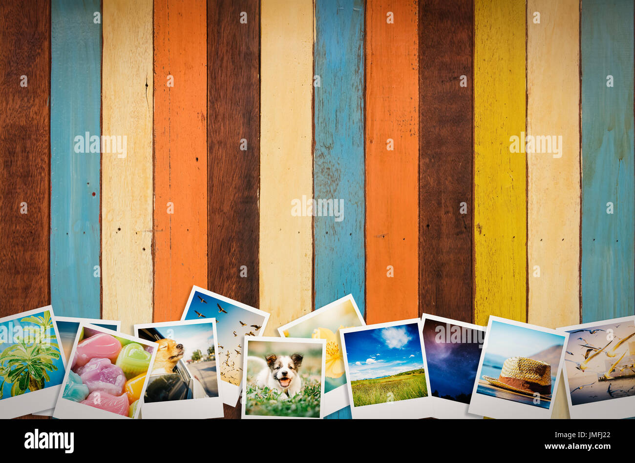 travel photo collage on wooden background Stock Photo