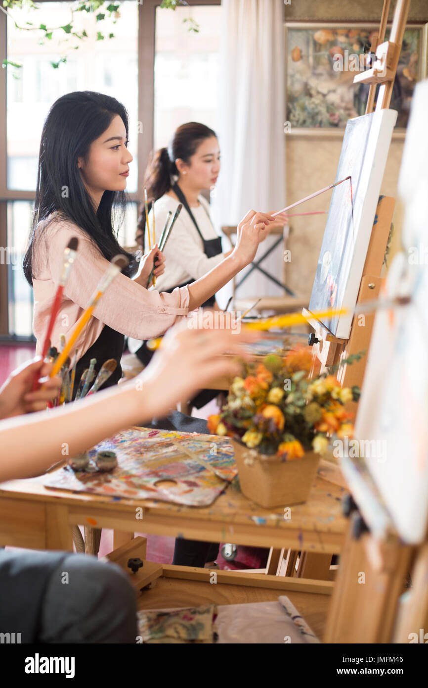 Indian women painting hi-res stock photography and images - Alamy