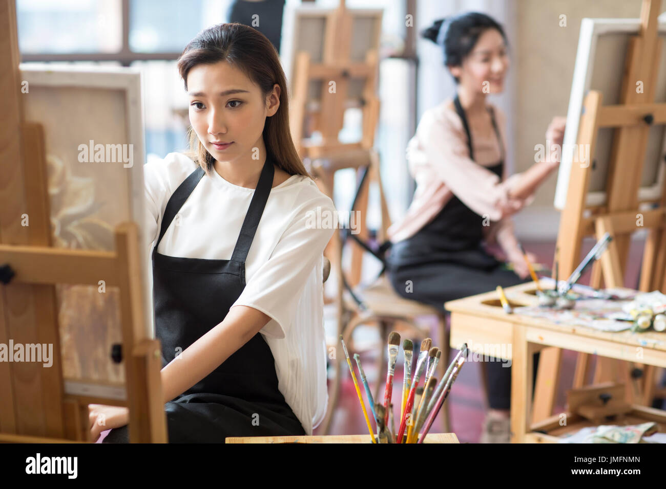 Two women painting drawing in hi-res stock photography and images - Alamy