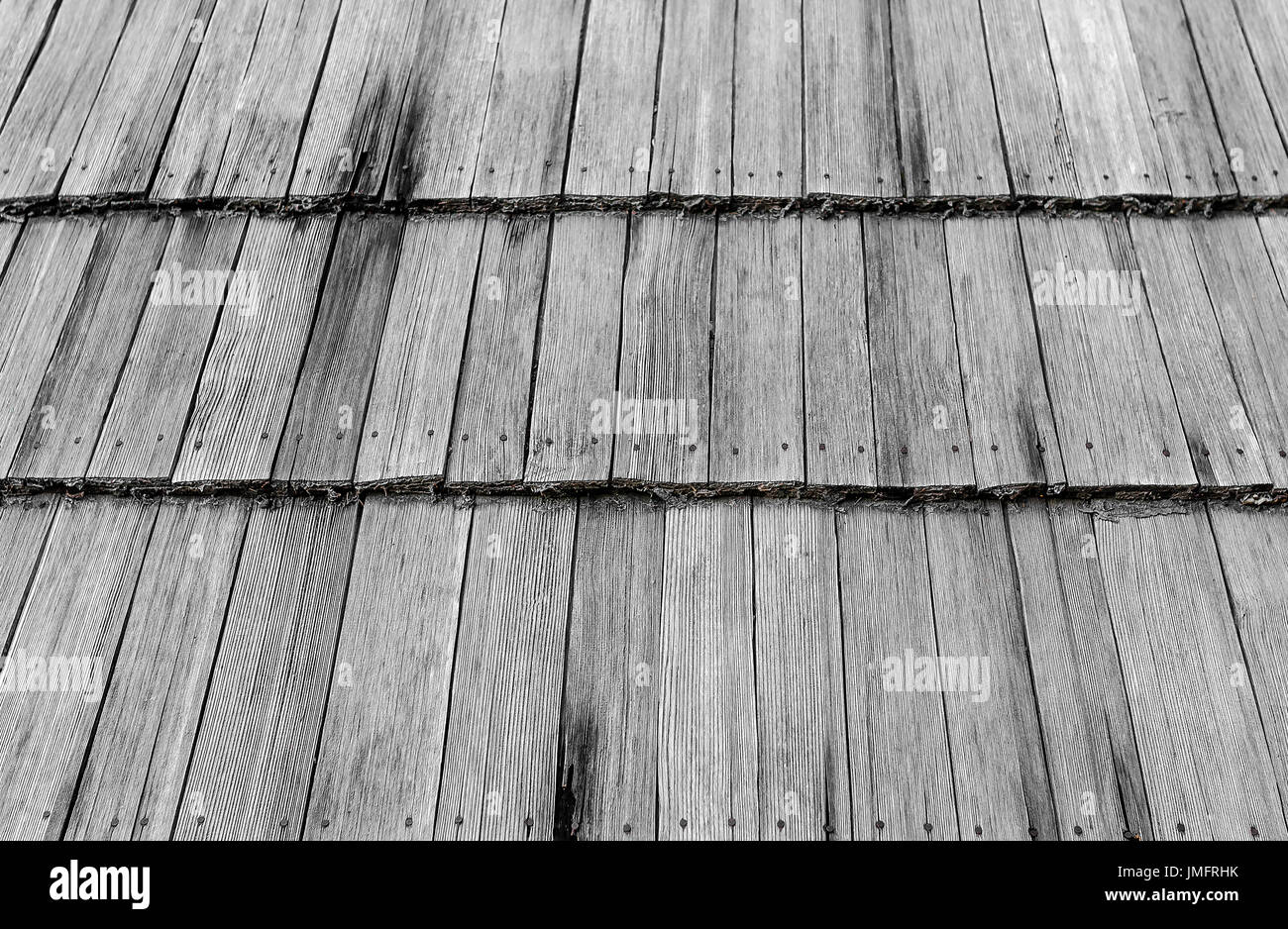 Wooden roof of an old house. Stock Photo