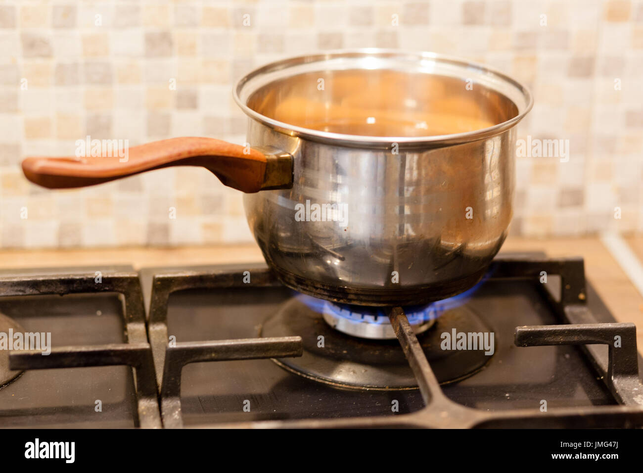 Eggs In Boiling Water On Kitchen Electric Stovetop Oven Burner Stock Photo  - Download Image Now - iStock