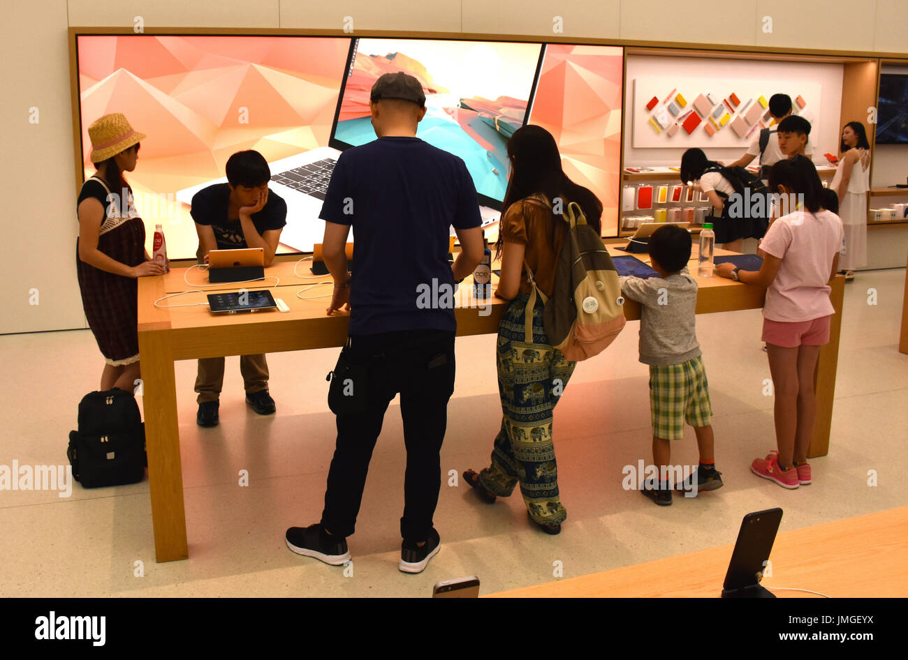 A Customer at an Apple Store Being Helped by an Apple Employee at an Apple  Store Editorial Stock Photo - Image of macbook, ipad: 235899068