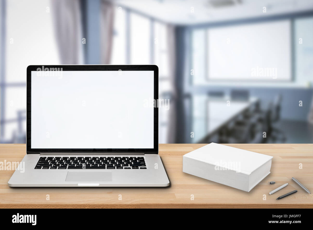 blank screen notebook on wooden table Stock Photo