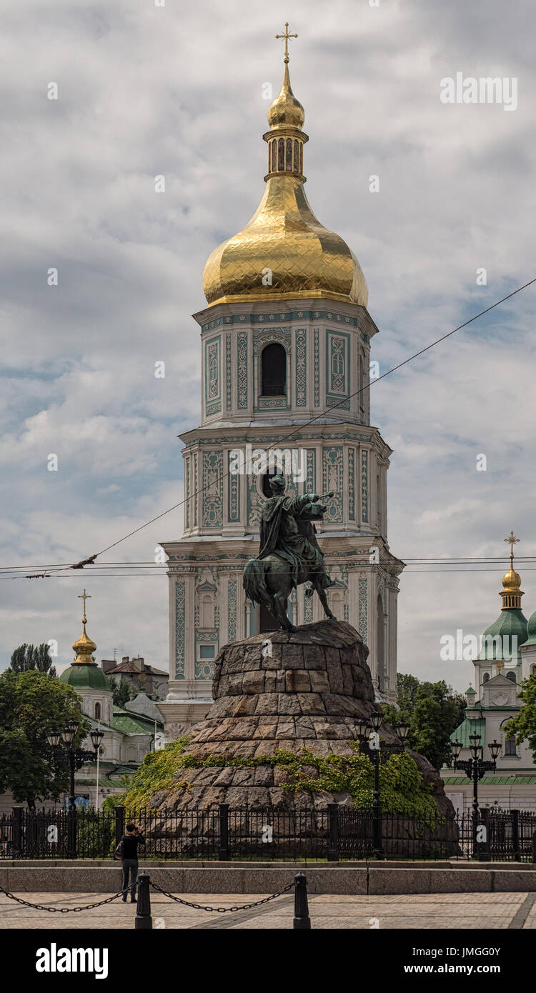 KYIV, UKRAINE -  JUNE 11, 2016:  Bohdan Khmelnytsky Monument in in front of St  Sophia Cathedral bell Tower Stock Photo