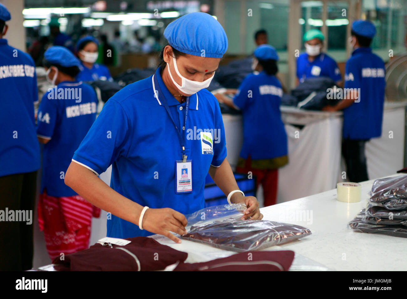 Workers in a readymade garment factory at Narayanganj on the Stock
