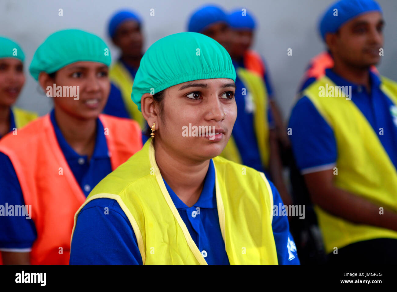 Readymade garment workers participate in a fire fighting training