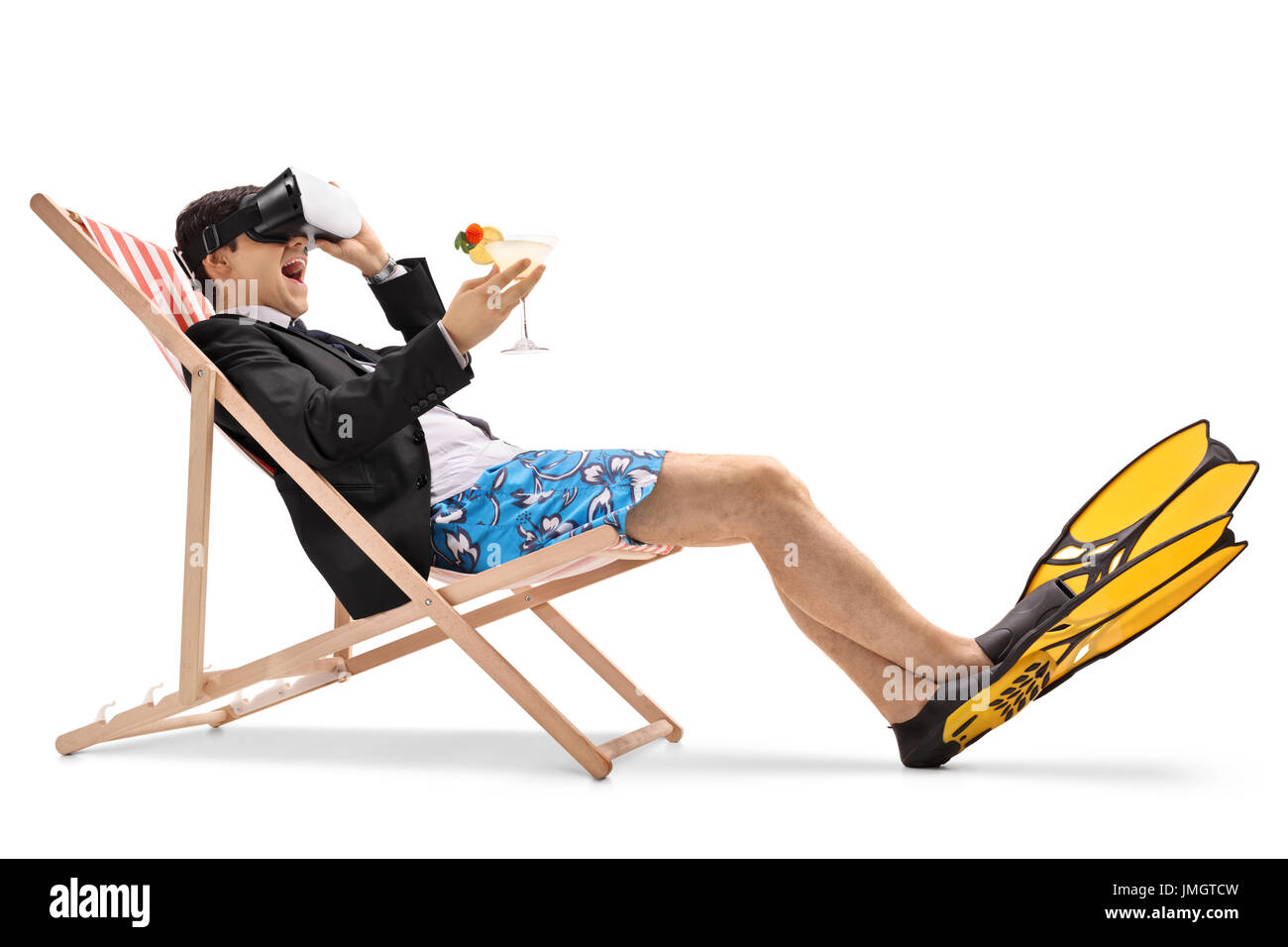 Businessman with a cocktail sitting in a deck chair and using a VR headset isolated on white background Stock Photo