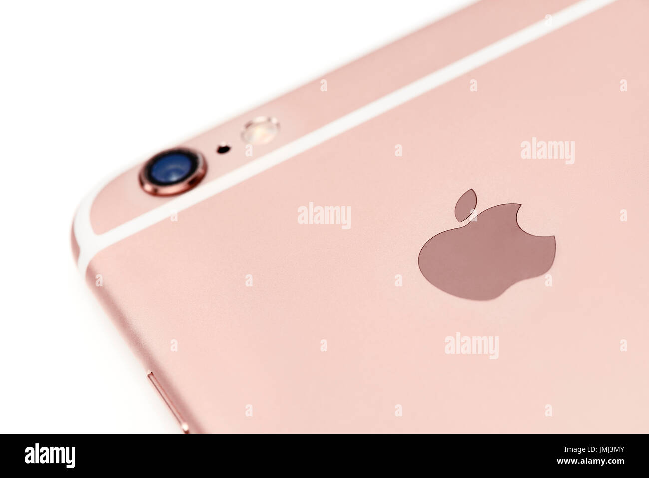 Closeup of Apple logo on rose gold iPhone 6s smartphone device isolated on white background Stock Photo