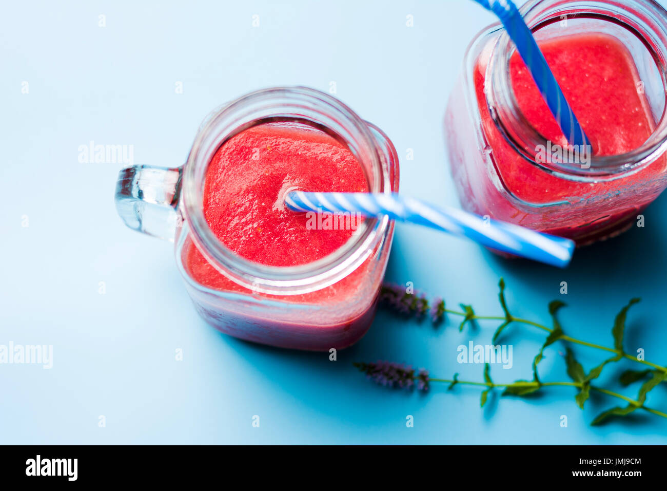 Two jars of healthy watermelon smoothie. Summer refreshment Stock Photo