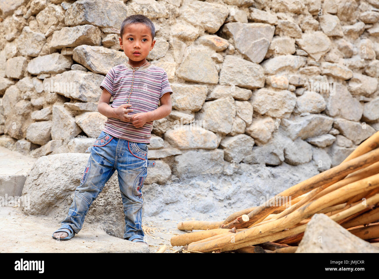 Leh, Ladakh, India, July 14, 2016: Portrait of a local boy on a street in Leh, Ladakh, India Stock Photo