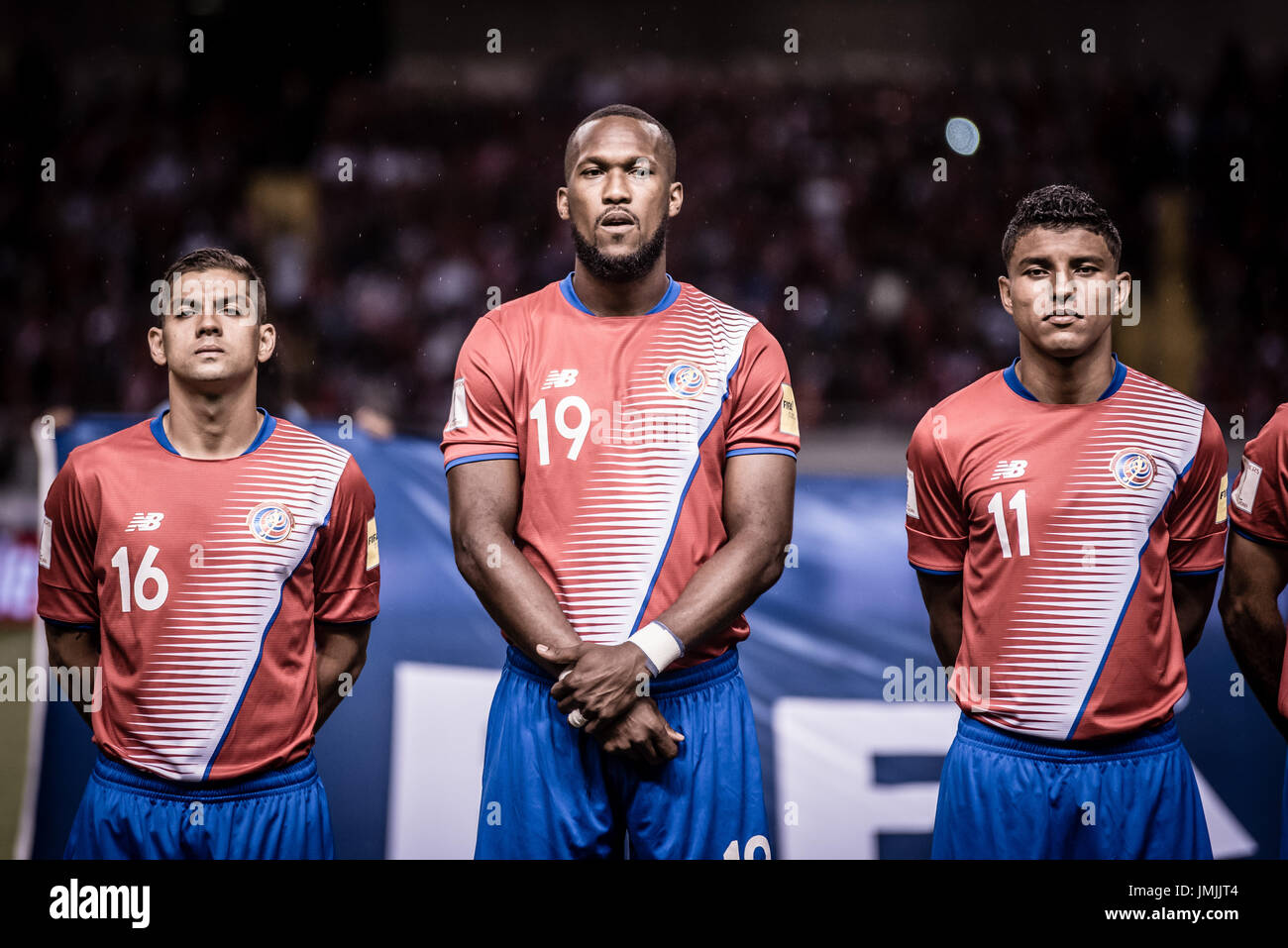 SAN JOSE, COSTA RICA. JUNE 13, 2017 - Costa Rica players Cristian Gamboa, Kendall Waston and Johan Venegas, singing the national anthem previous to th Stock Photo