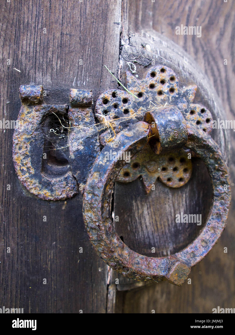 Iron Latch and Lock on Medieval Church Door Stock Photo