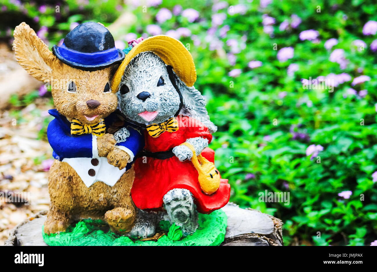Mr and Mrs Rabbit Garden Ornament Stock Photo - Alamy