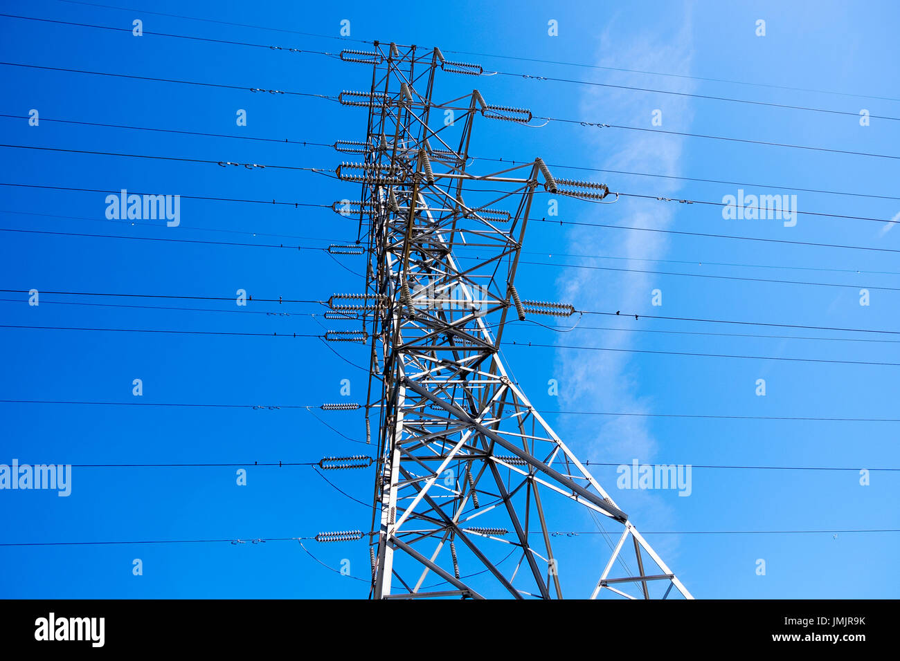 Looking up at a steel hydro tower strung with high voltage cables Stock ...