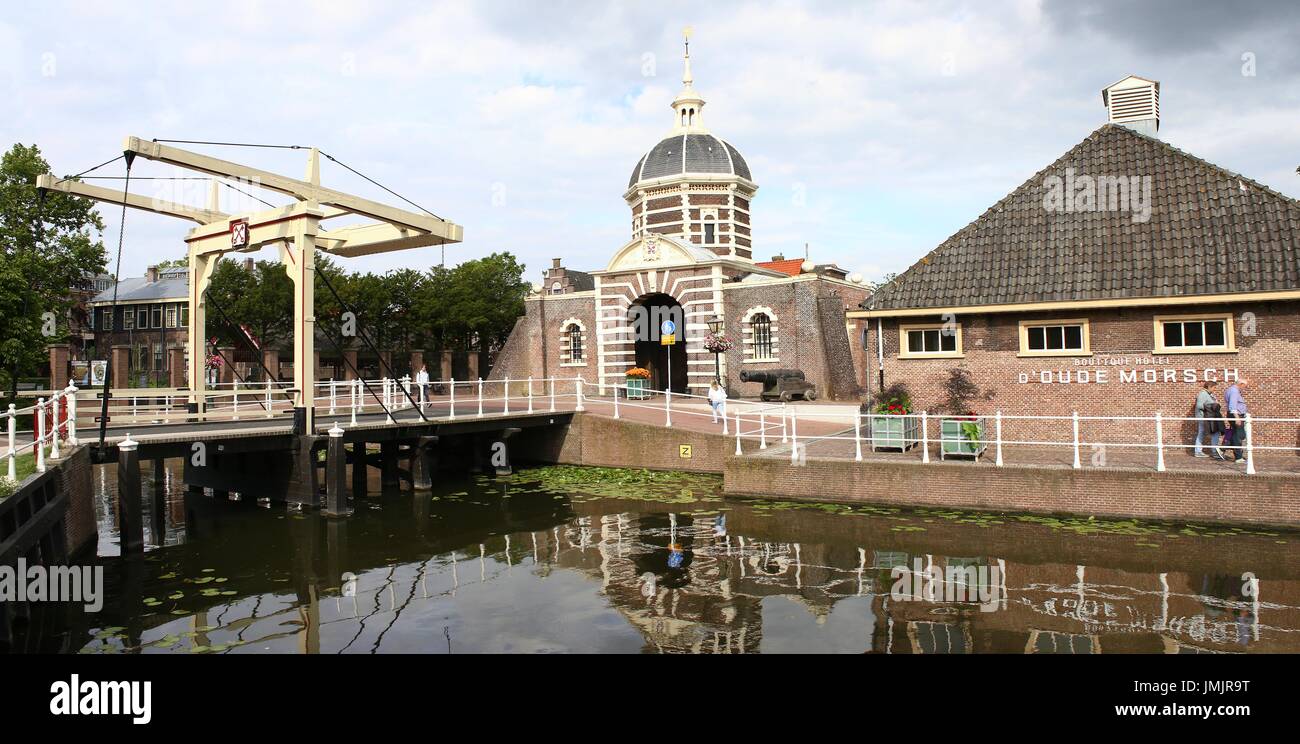 17th century Morspoort, western city gate in Leiden, The Netherlands. In front Morspoort brug, a restored wooden draw bridge. (stitch of 2 images) Stock Photo