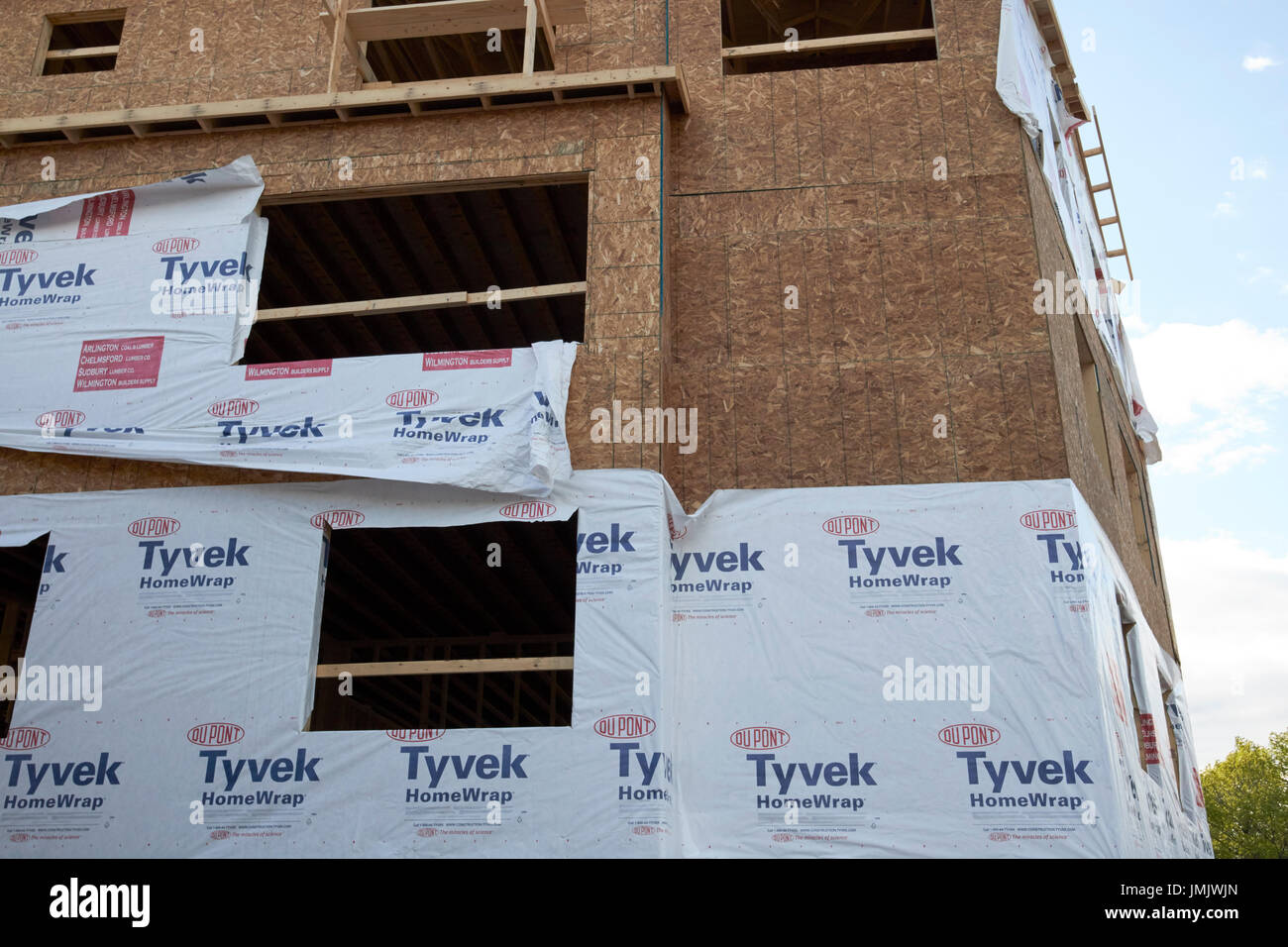 tyvek homewrap on new build apartment buildings under construction Boston USA Stock Photo