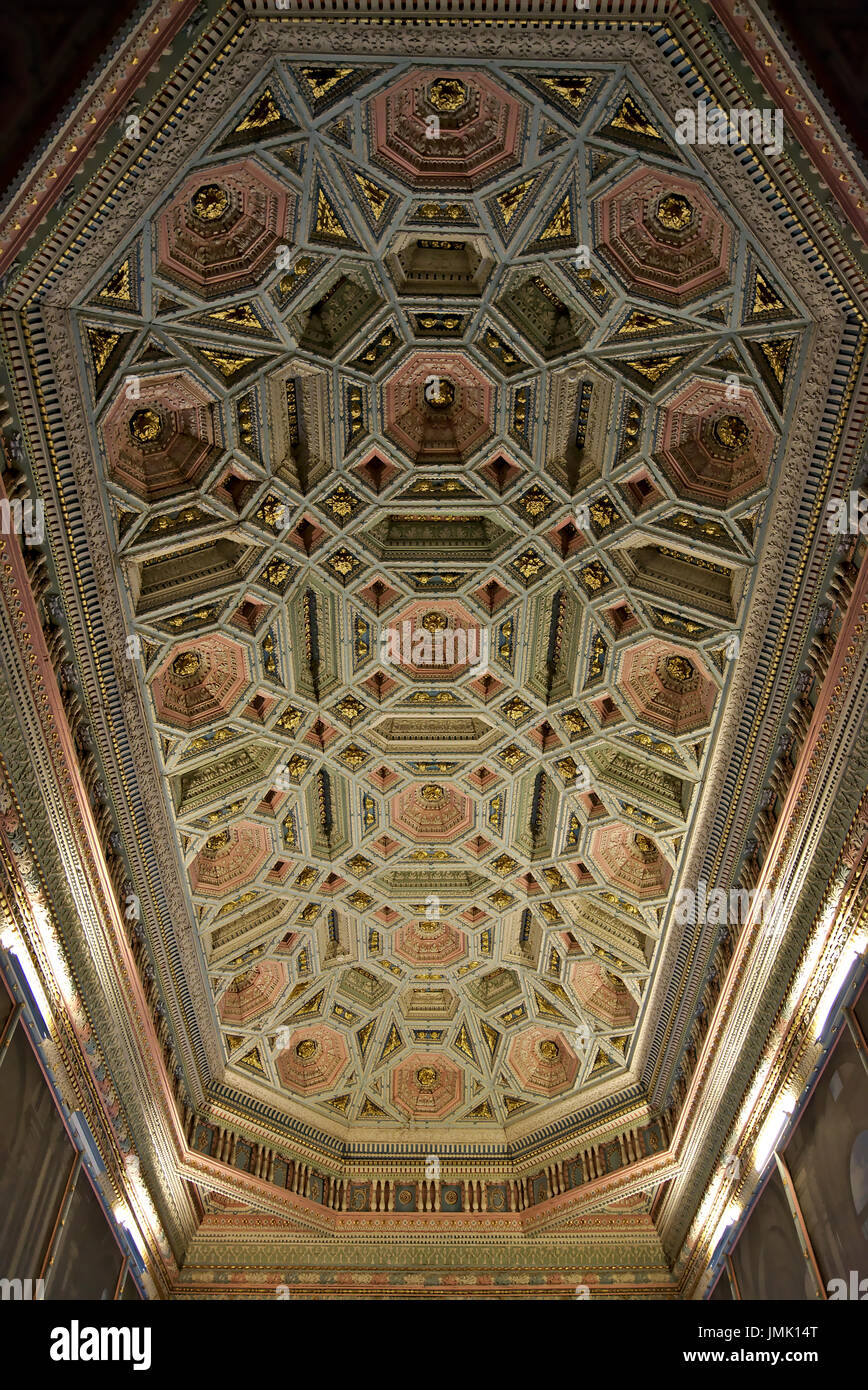 Octogonal rectangular pink wooden panelling in the ceiling of the ...