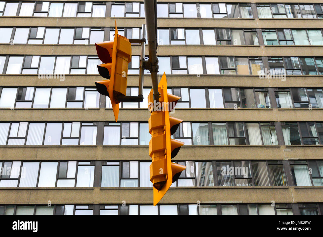 Traffic light in Toronto downtown, Canada. Pedestrians obey your