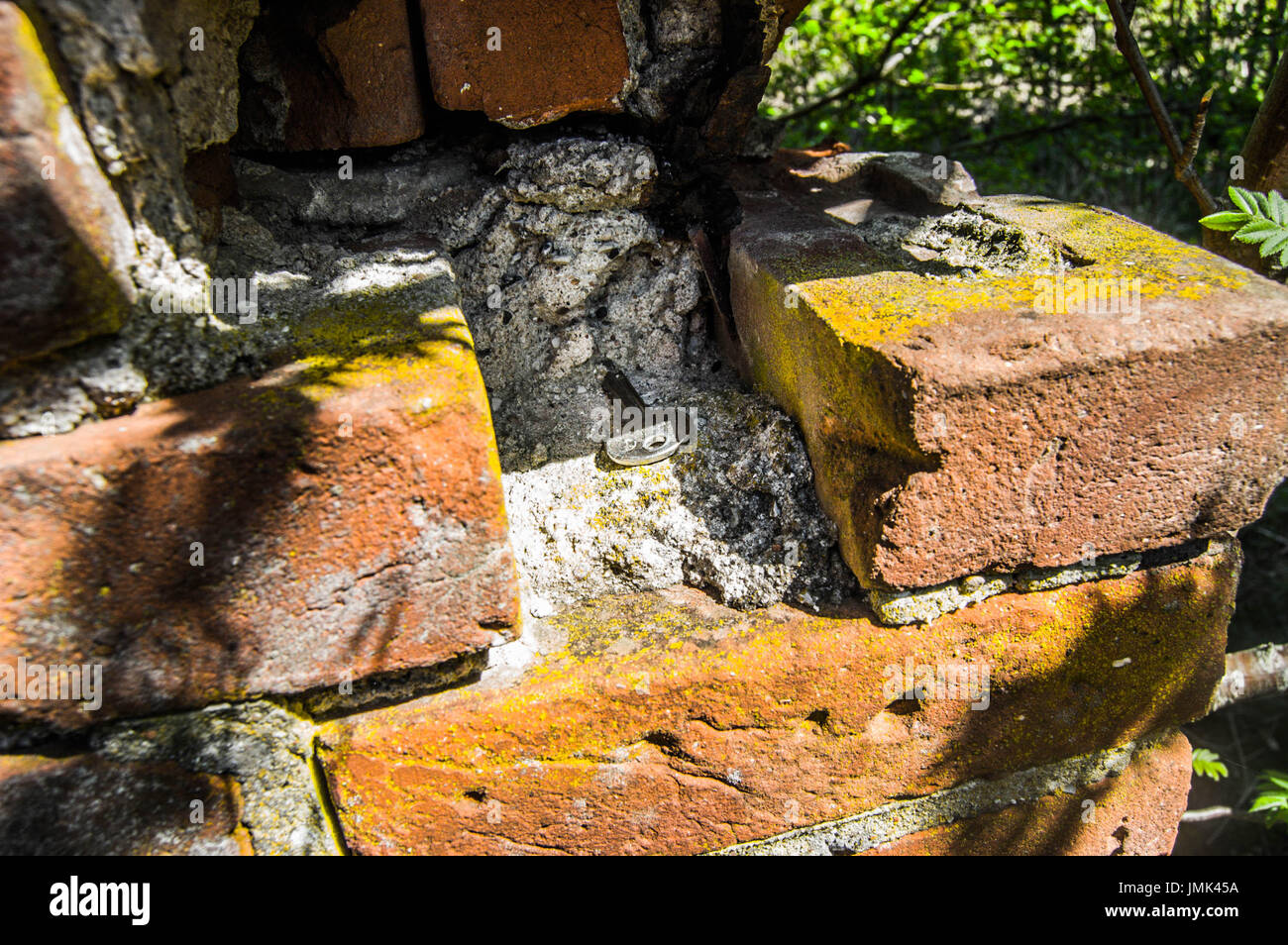 A key hidden in plain sight at an abandoned house Stock Photo Alamy