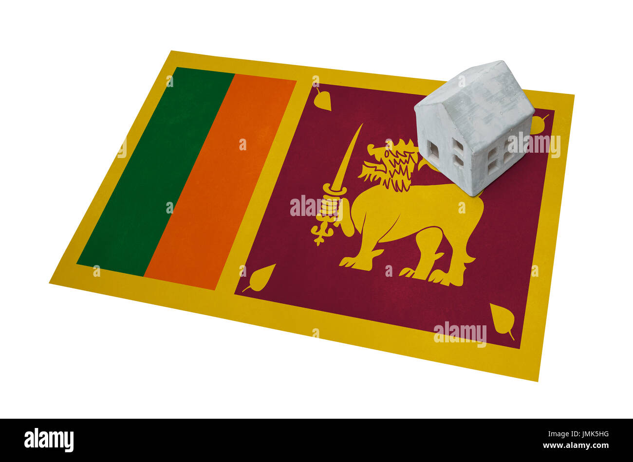 Small house on a flag - Living or migrating to Sri Lanka Stock Photo