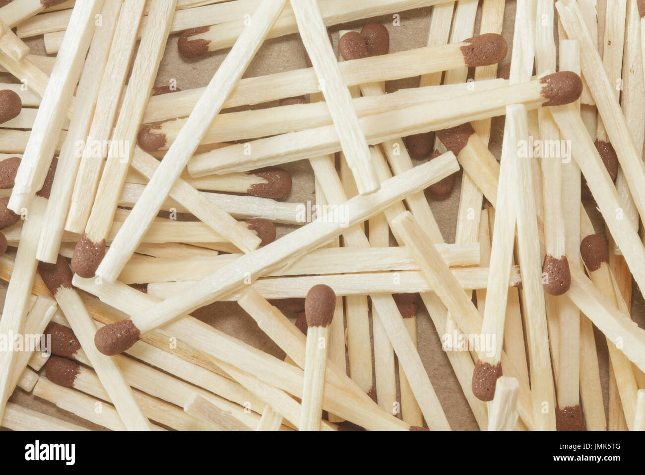 Wooden matches with brown heads closeup Stock Photo
