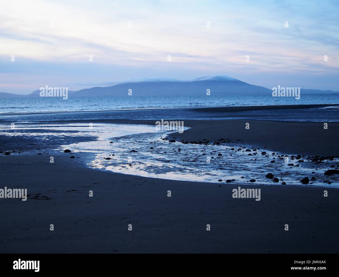 Cloud Capped Criffel from the Cumbrian Solway Coast, United Kingdom Stock Photo