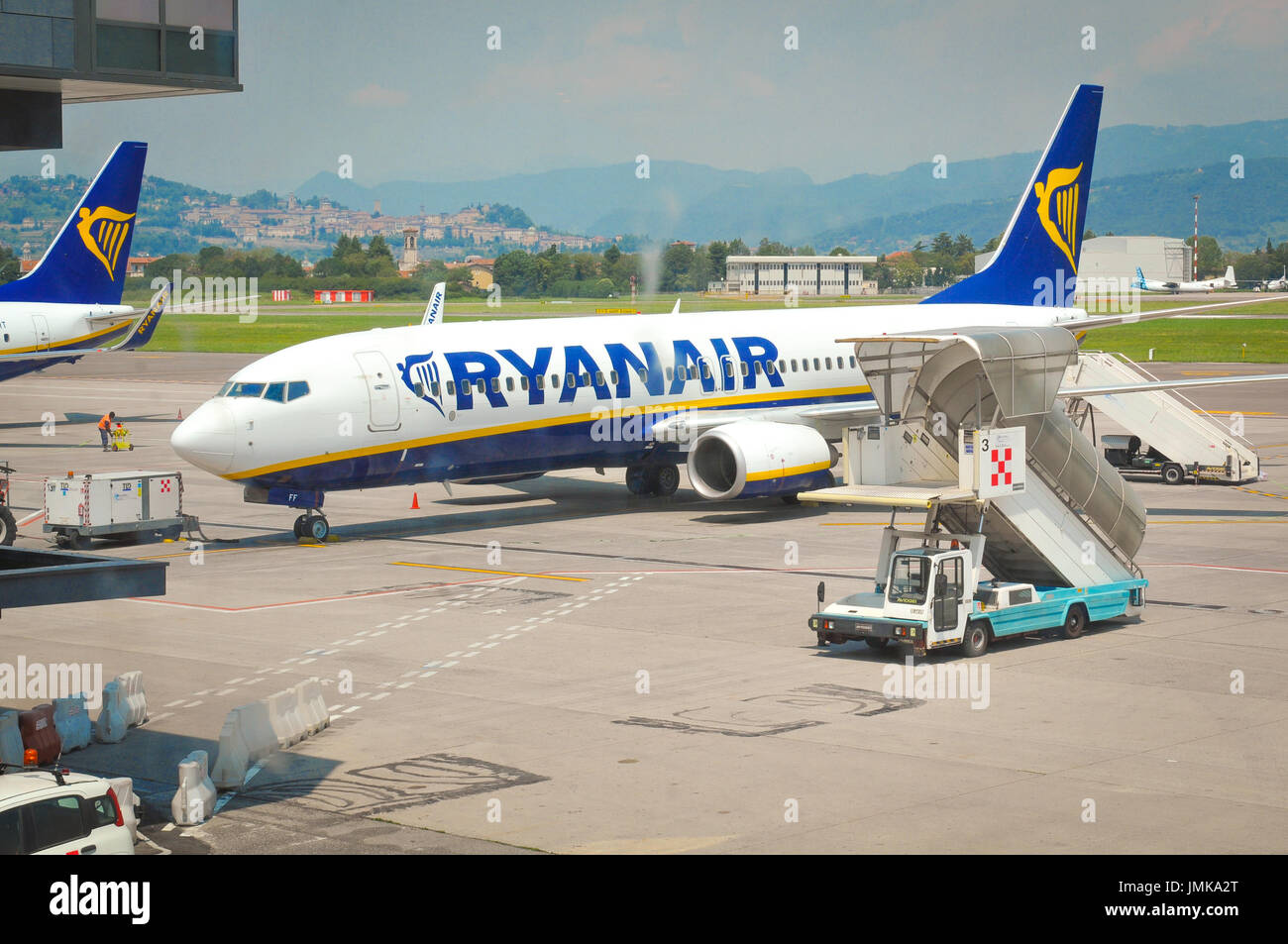 Milan, Italy - June 29, 2016: A Ryanair flight is preparing to take off from Bargamo Airport in Milan, Italy. Stock Photo