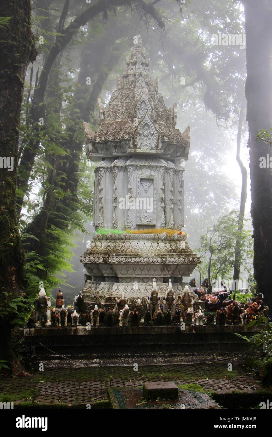 Buddhist monument in the cloud forest on Doi Inthanon, tallest peak in Thailand Stock Photo