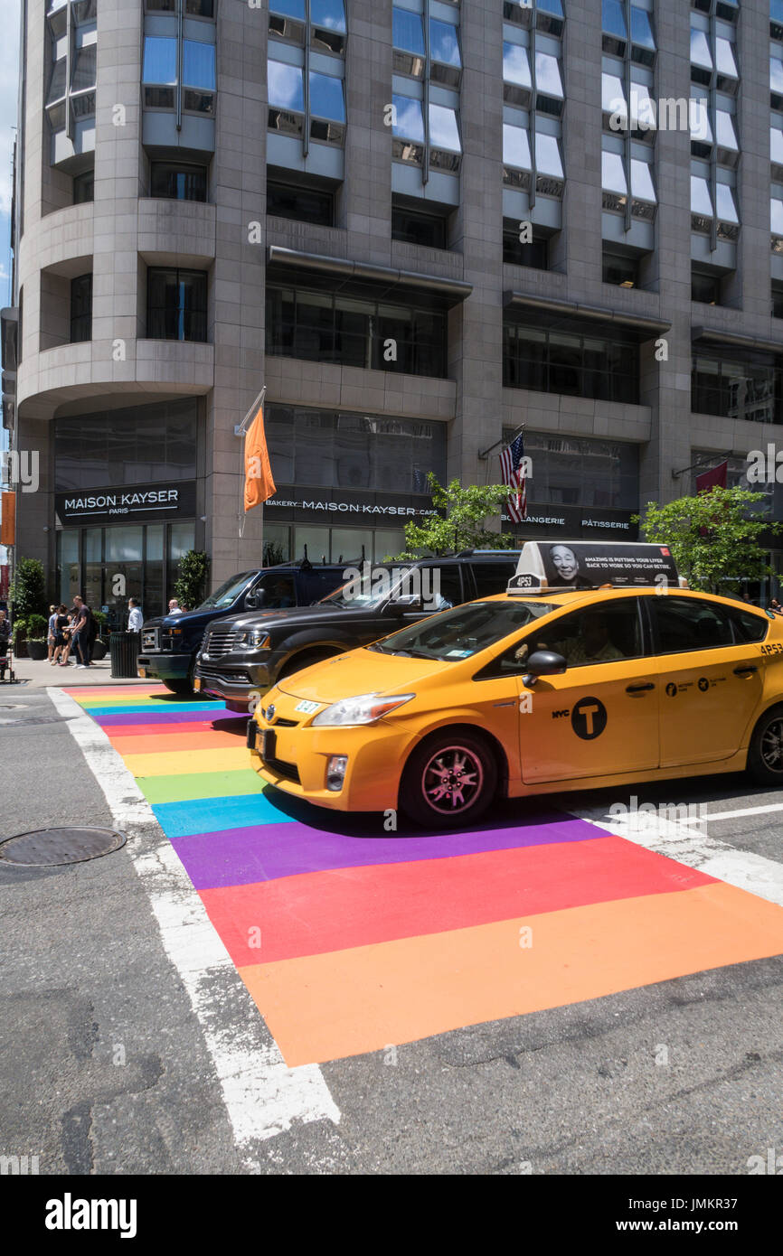 Fifth Avenue and 36th Street Intersection with Rainbow Painted Crosswalk, NYC, USA Stock Photo