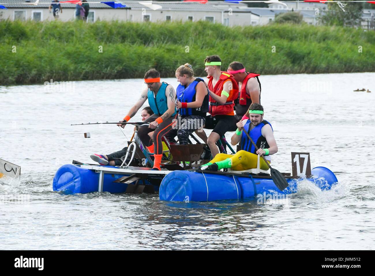 West Bay, Dorset, UK.  27th July 2017.  Annual RNLI Raft Race on the River Brit at the seaside resort of  West Bay in Dorset.  A peddle powered raft.  Picture Credit: Graham Hunt/Alamy Live News Stock Photo