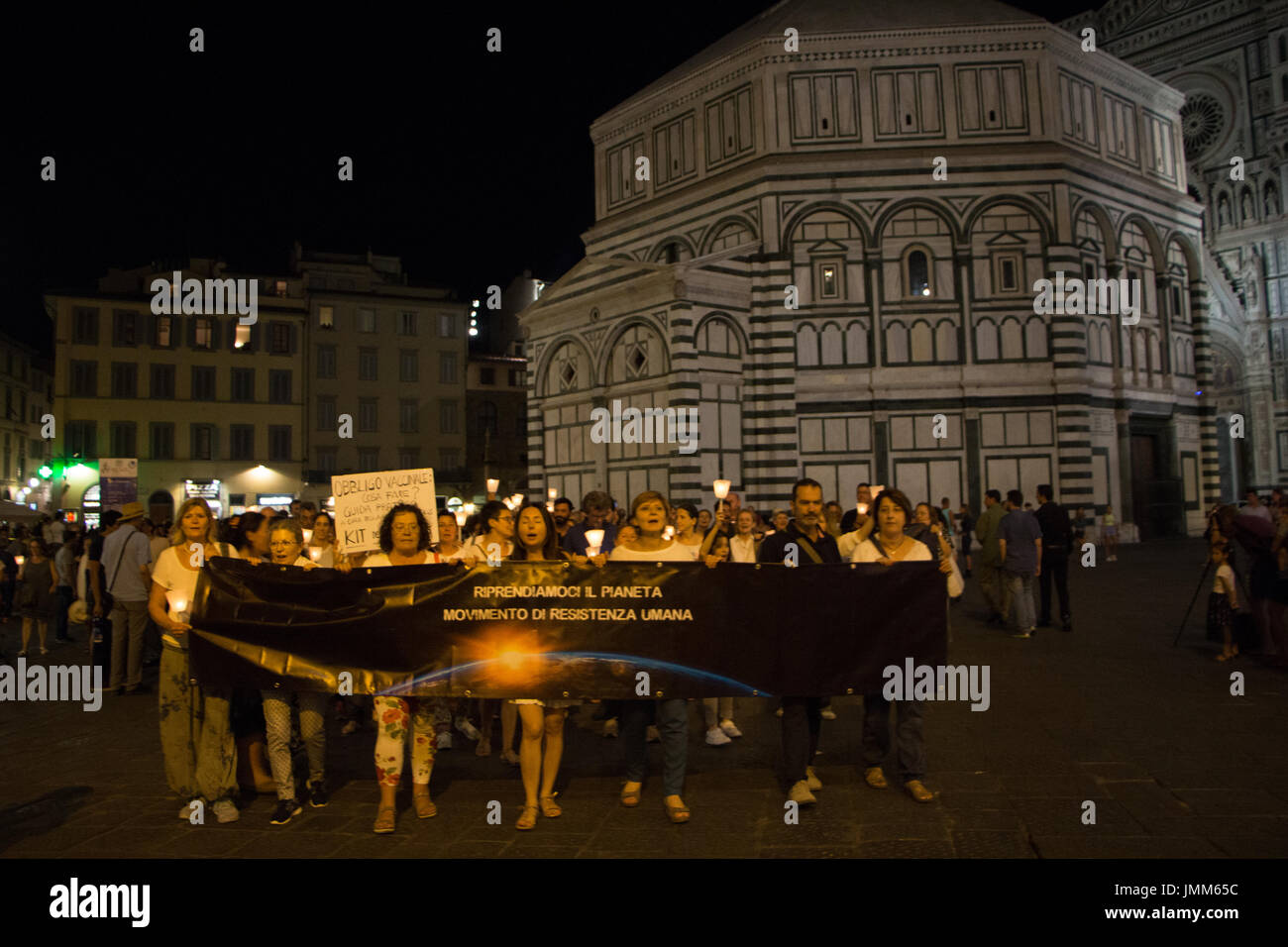 Florence, Italy. 27th July, 2017. Protesters in Florence Italy march against a new law introduced by the government which mandates vaccinations for school-children. Credit: Joseph Suschitzky/Alamy Live News Stock Photo