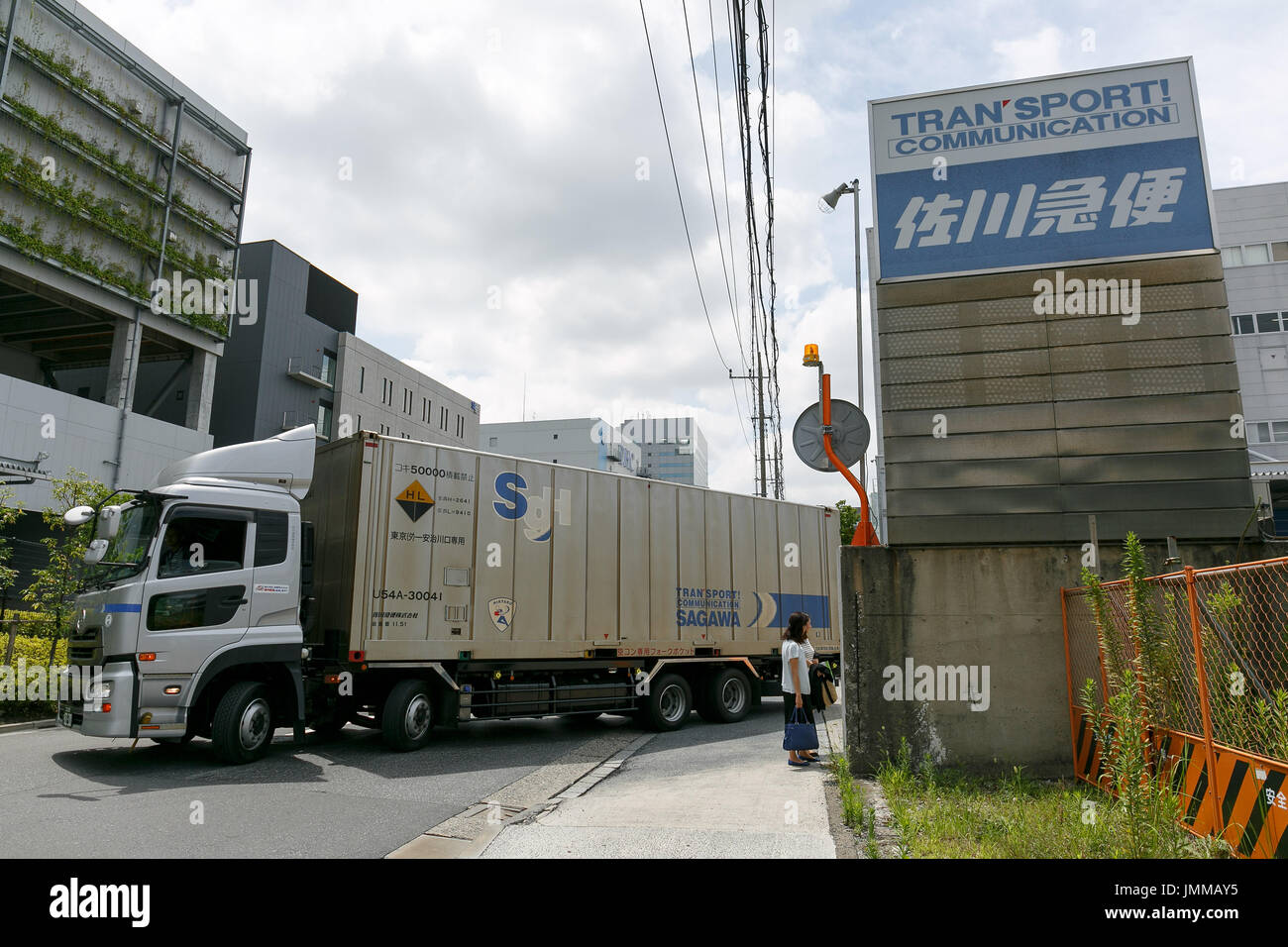 A Sagawa Express delivery truck leaves the Sagawa headquarters on July 28, 2017, Tokyo, Japan