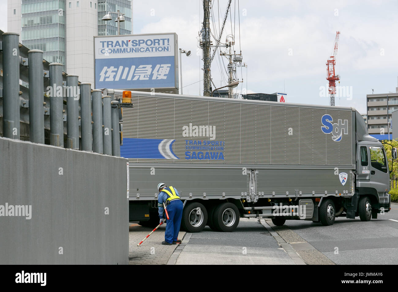 A Sagawa Express delivery truck leaves the Sagawa headquarters on July 28, 2017, Tokyo, Japan