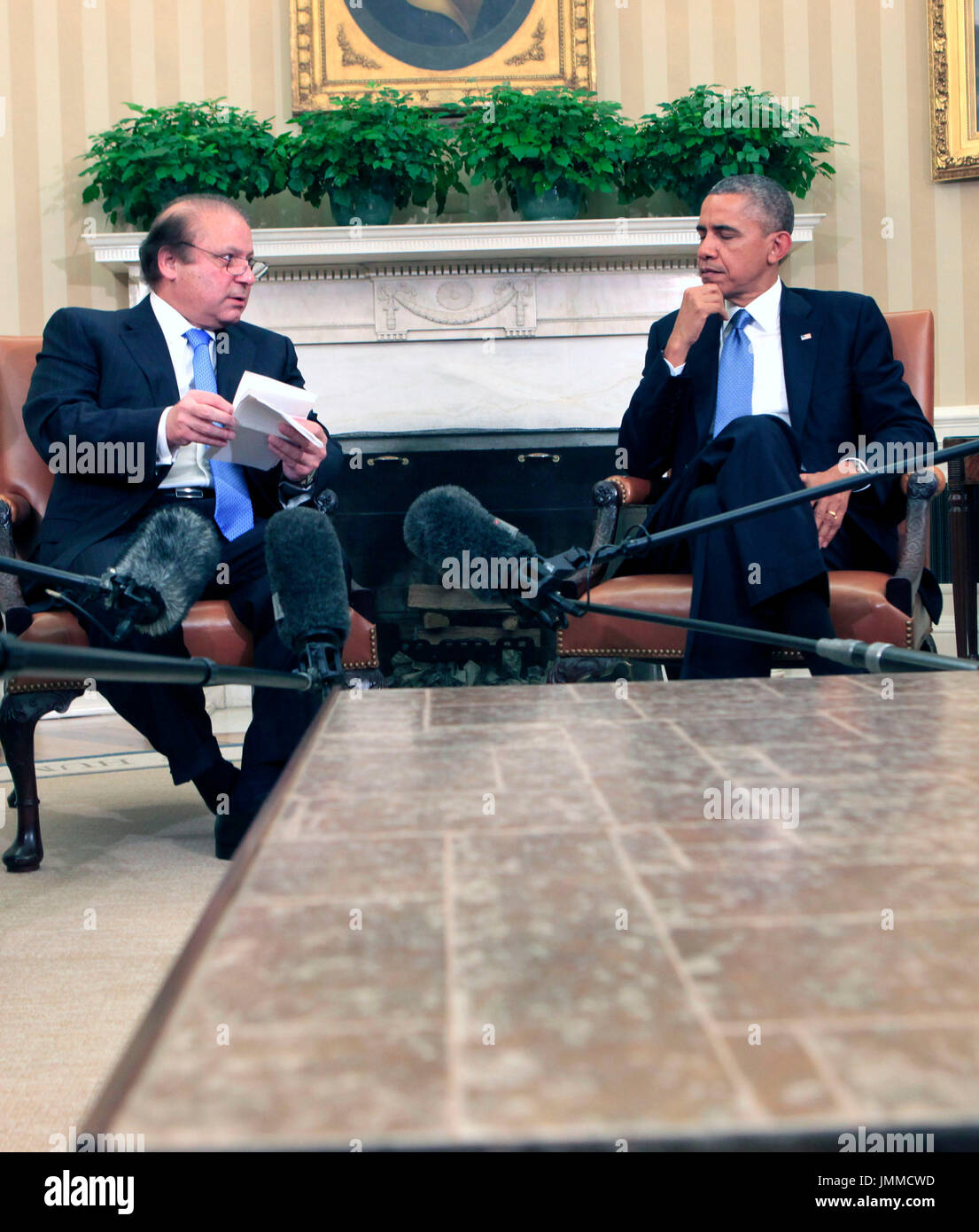 United States President Barack Obama meets with Prime Minister Nawaz Sharif  of Pakistan in the Oval Office of the White House in Washington, . on  October 23, 2013. Credit: Dennis Brack /