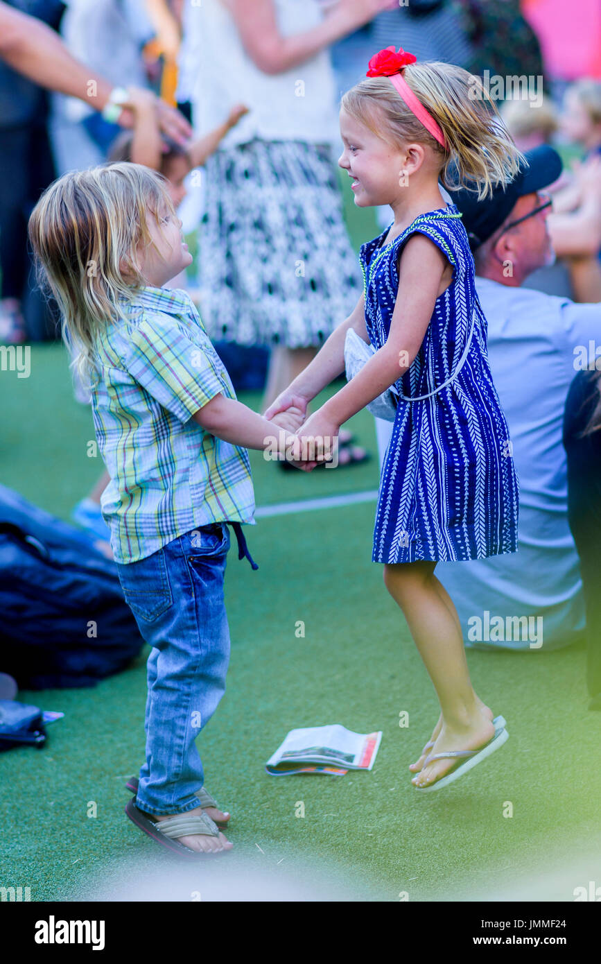 Kids enjoy dancing to the Jerry Cans from Nunavut perform at the Drum