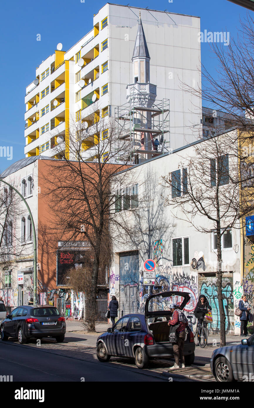 Berlin, Germany,  downtown, Kreuzberg district, Kottbusser Tor area,  shops, bars, apartment houses, Mevlana mosque, minaret, Stock Photo