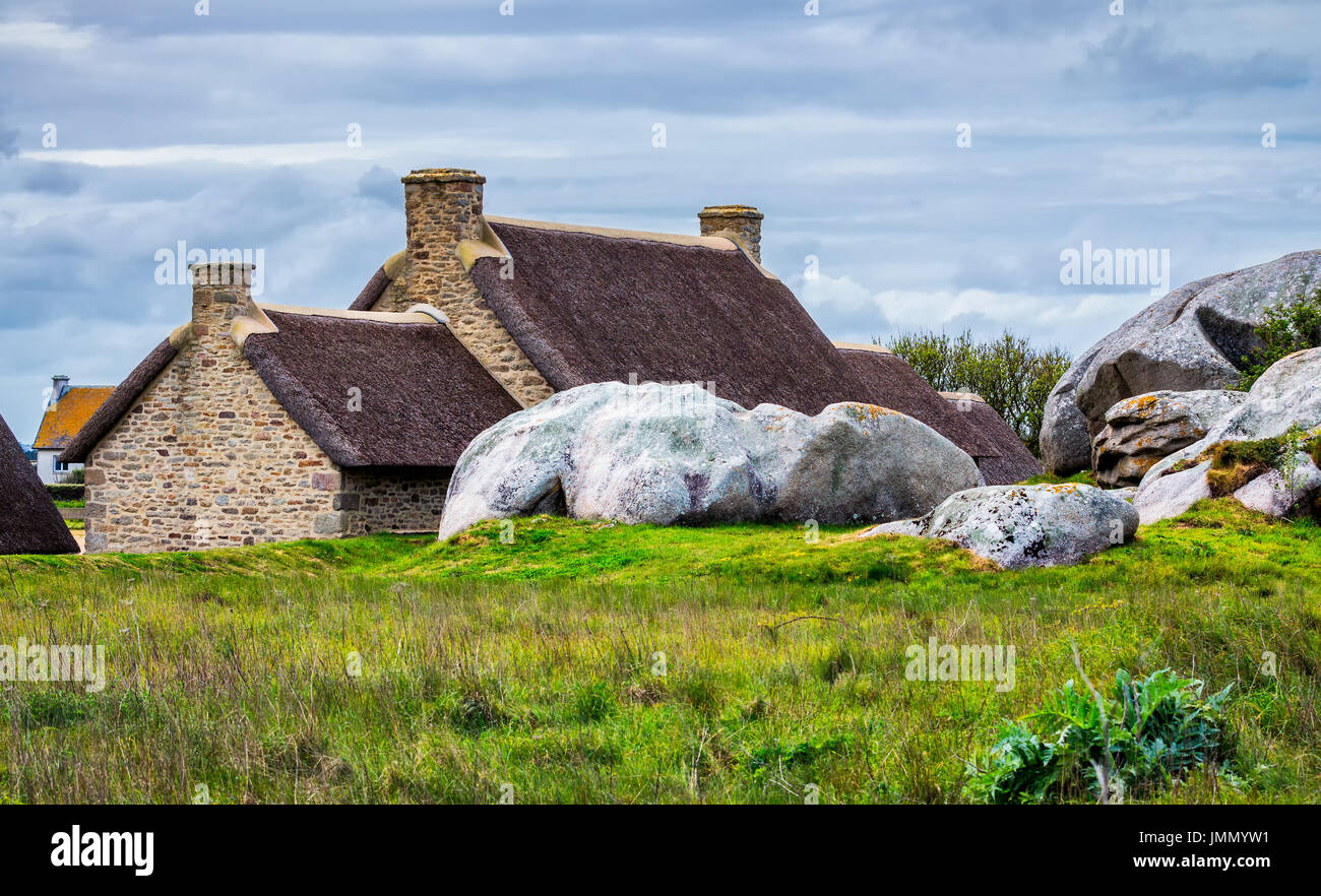 Pink Rocks France The pink granite rocks with strange shapes, coast in Brittany. The mass ...
