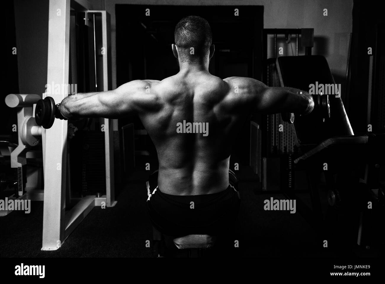 Shoulder muscles exercise Black and White Stock Photos & Images - Alamy