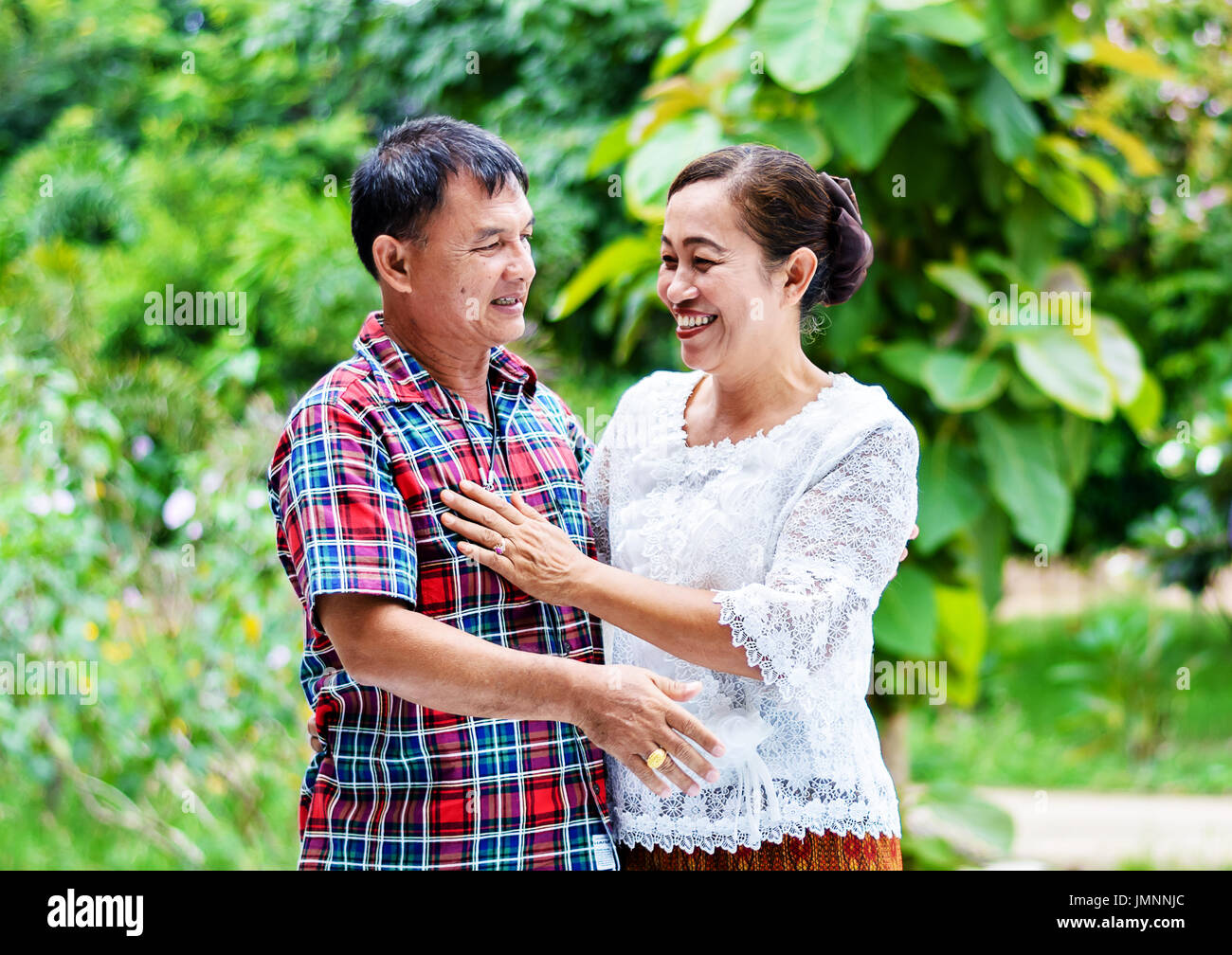 Happy senior couple in love. Park outdoors Stock Photo - Alamy