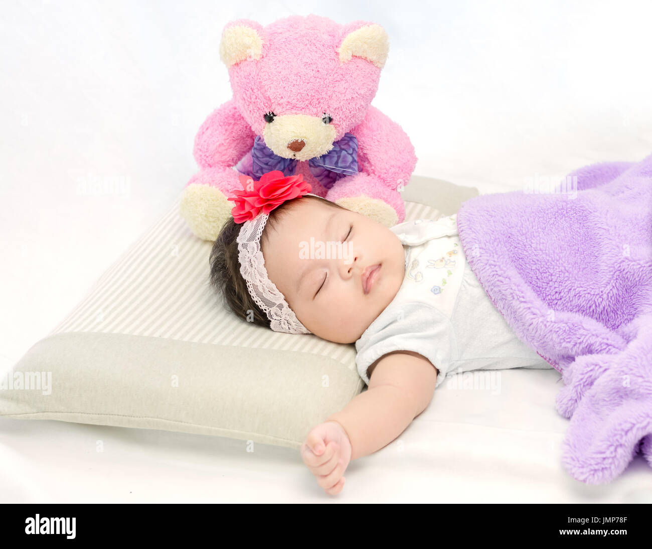 Chinese girl sleeping teddy bear hi-res stock photography and images ...