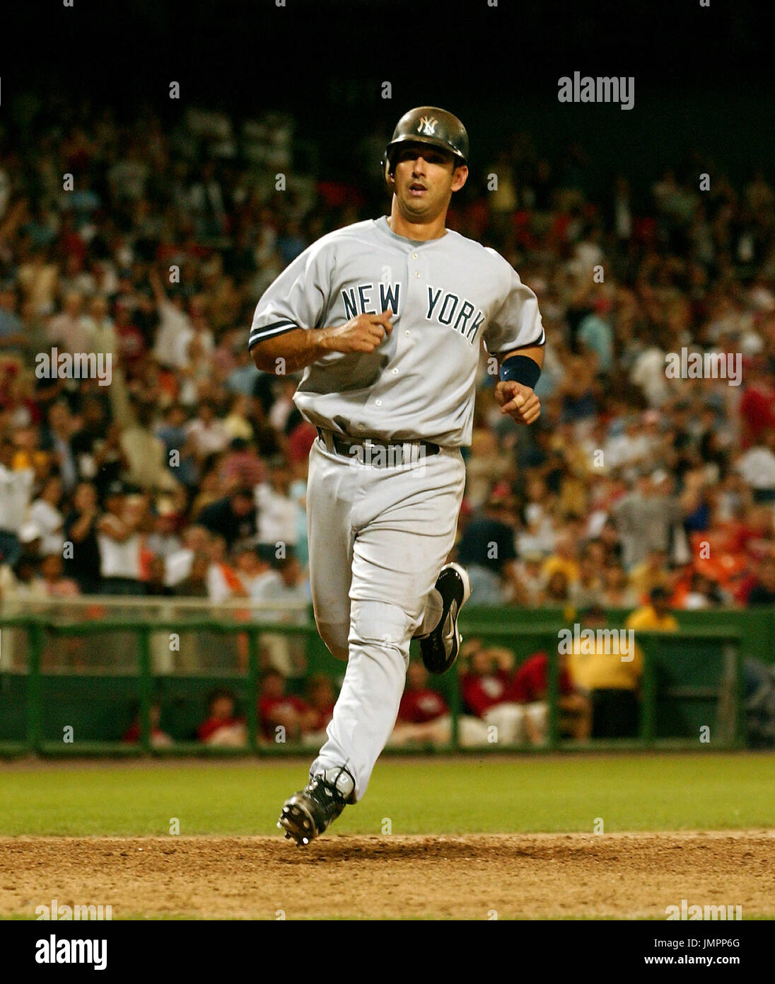 Washington, D.C. - June 16, 2006 -- New York Yankees catcher Jorge Posada (20) scores the insurance run in the ninth inning against the Washington Nationals at RFK Stadium in Washington, D.C. on June 16, 2006.  The Yankees won the game 7 - 5. Credit: Ron Sachs / CNP Stock Photo