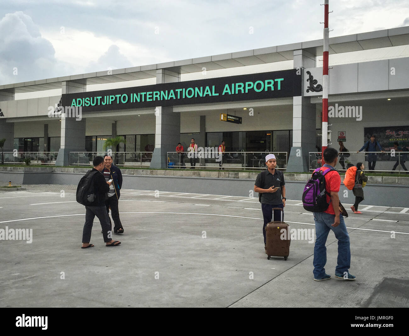 Yogyakarta, Indonesia - Apr 13, 2016. People at Adisutjipto Airport in Yogyakarta, Indonesia. The Airport is the 4th busiest airport in the region of  Stock Photo